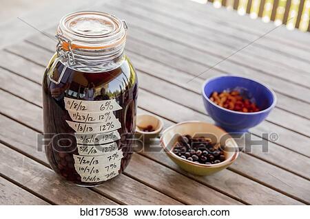 Stock Photo - Olives with nuts on table. Fotosearch