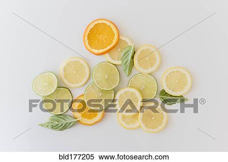 Stock Photography - Orange, lemon and lime slices. Fotosearch