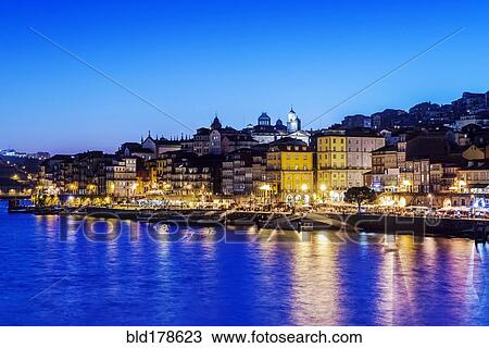 Porto cityscape and harbor illuminated at night, Porto, Portugal View Large Photo Image Stock Image - Porto cityscape and harbor illuminated at night, Porto, Portugal. Fotosearch