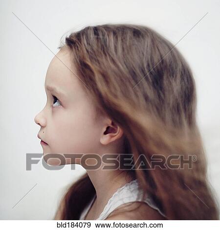 Profile of Caucasian girl looking up View Large Photo Image Stock Photo - Profile of Caucasian girl looking up. Fotosearch