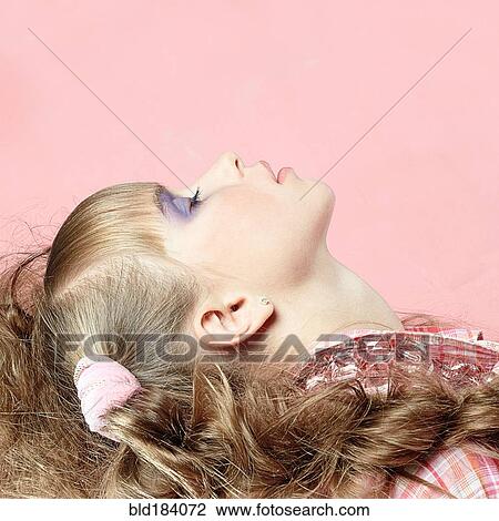 Profile of Caucasian girl wearing makeup View Large Photo Image Stock Image - Profile of Caucasian girl wearing makeup. Fotosearch