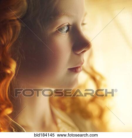 Stock Photography - Profile of Caucasian teenage girl with curly hair. Fotosearch