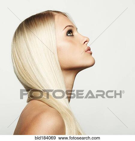 Stock Photo - Profile of Caucasian woman looking up. Fotosearch