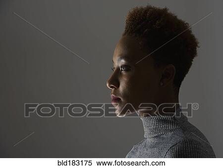 Stock Photography - Profile of mixed race woman. Fotosearch