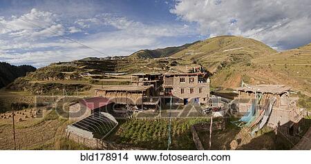 Picture - "Remote monastery and mountain landscape, Qinghai, Tibet, China". Fotosearch