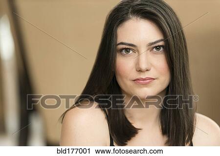 Serious Hispanic woman View Large Photo Image Stock Image - Serious Hispanic woman. Fotosearch