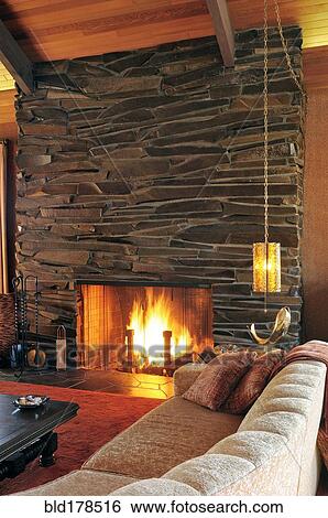 Sofa and fireplace in modern living room View Large Photo Image Stock Photograph - Sofa and fireplace in modern living room. Fotosearch