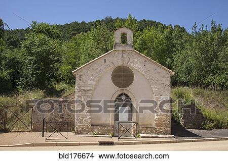 Picture - Stone church building in rural village. Fotosearch