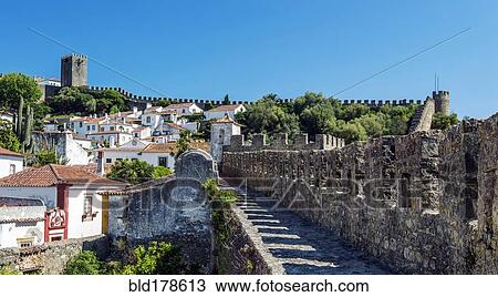 Stone walkway and Obidos cityscape, Leiria, Portugal View Large Photo Image Stock Image - Stone walkway and Obidos cityscape, Leiria, Portugal. Fotosearch