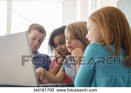 Students using laptop in classroom View Large Photo Image Stock Image - Students using laptop in classroom. Fotosearch