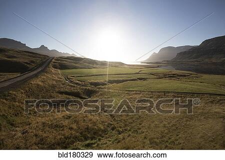 Sunrise over remote fields View Large Photo Image Stock Photo - Sunrise over remote fields. Fotosearch