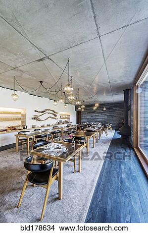 Tables and chairs in modern cafe View Large Photo Image Picture - Tables and chairs in modern cafe. Fotosearch