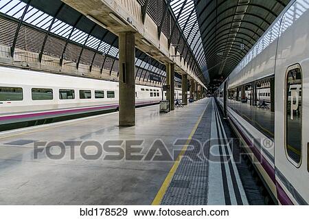Train in urban train station View Large Photo Image Stock Photo - Train in urban train station. Fotosearch