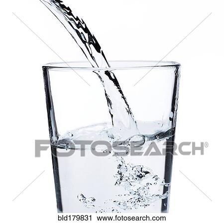 Stock Image - Water pouring into glass. Fotosearch
