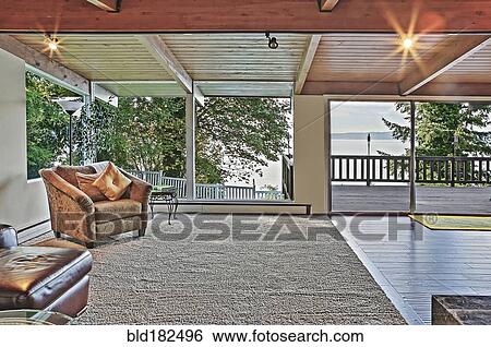 Window with lake view in living room View Large Photo Image Stock Photograph - Window with lake view in living room. Fotosearch