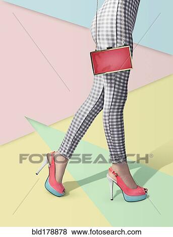 Woman wearing high heels and pants View Large Photo Image Stock Photo - Woman wearing high heels and pants. Fotosearch