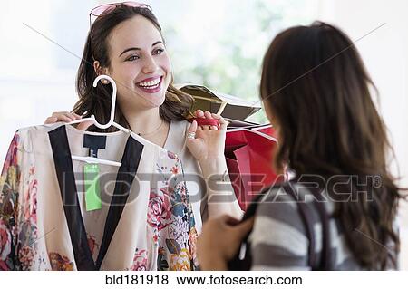 Stock Photo - Women shopping in store. Fotosearch