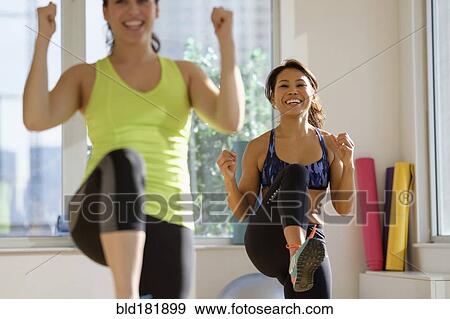 Stock Photo - Women taking exercise class. Fotosearch