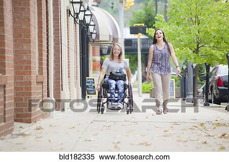 Women talking on sidewalk View Large Photo Image Stock Photography - Women talking on sidewalk. Fotosearch