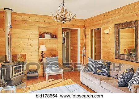 Wood paneling in rustic living room View Large Photo Image Picture - Wood paneling in rustic living room. Fotosearch