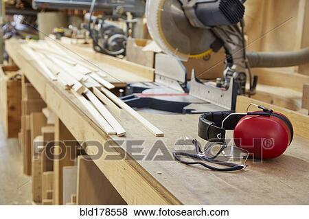 Stock Photo - Wood, workbenches and tools in workshop. Fotosearch