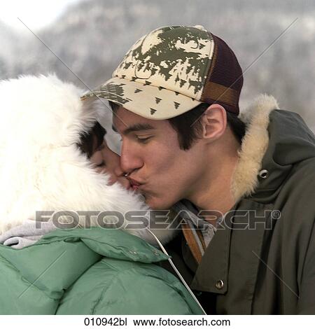 a kiss between teenagers View Large Photo Image Stock Image - a kiss between teenagers. Fotosearch