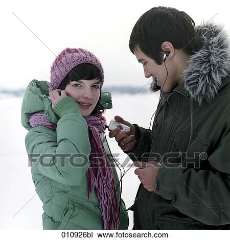 a teenage couple with their cellular phones View Large Photo Image Stock Image - a teenage couple with their cellular phones. Fotosearch