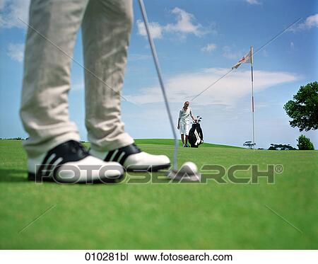 blurred detail shot of a man playing golf View Large Photo Image Stock Image - blurred detail shot of a man playing golf. Fotosearch