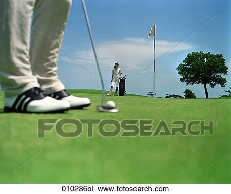 blurred detail shot of a man playing golf View Large Photo Image Stock Image - blurred detail shot of a man playing golf. Fotosearch