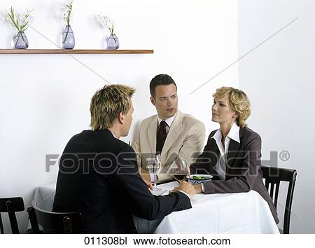 business lunch in a restaurant View Large Photo Image Stock Image - business lunch in a restaurant. Fotosearch
