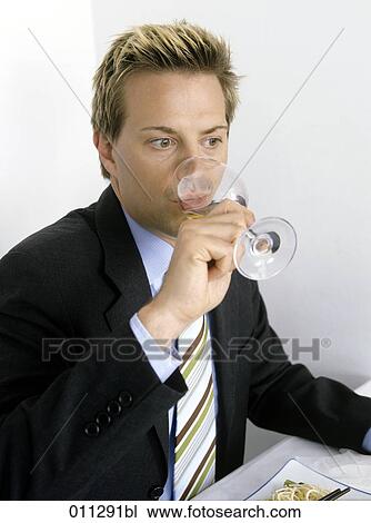 businessman drinking glass of wine View Large Photo Image Stock Image - businessman drinking glass of wine. Fotosearch
