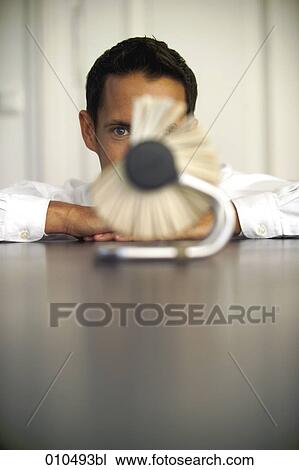 businessman looking at rolodex View Large Photo Image Stock Image - businessman looking at rolodex . Fotosearch