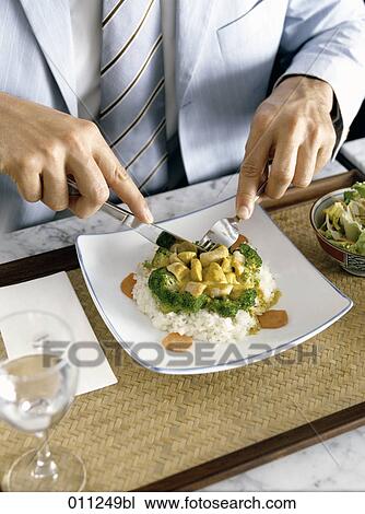 Stock Image - businessmen having a conversation . Fotosearch