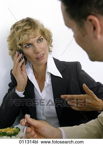 businesswoman receiving a phone call at business lunch View Large Photo Image Stock Image - businesswoman receiving a phone call at business lunch. Fotosearch