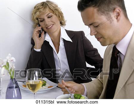 businesswoman talking on the mobile during lunch View Large Photo Image Stock Image - businesswoman talking on the mobile during lunch. Fotosearch