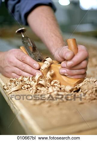 carpenter working with a plane View Large Photo Image Stock Image - carpenter working with a plane. Fotosearch