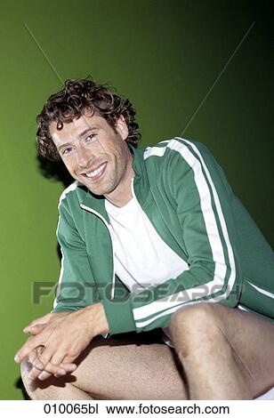 caucasian male without trousers sitting and smiling View Large Photo Image Stock Image - caucasian male without trousers sitting and smiling. Fotosearch
