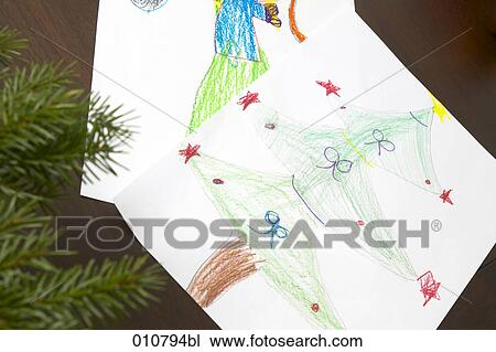 Stock Image - children drawings with christmas motifs. Fotosearch