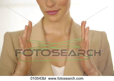 close-up of businesswoman doing the cat´s cradle View Large Photo Image Stock Image - close-up of businesswoman doing the cat´s cradle. Fotosearch