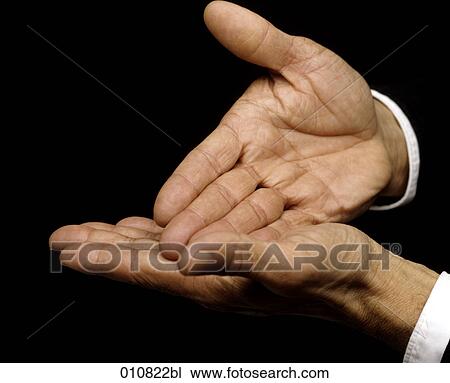 Stock Image - Close-up of gesturing hands. Fotosearch