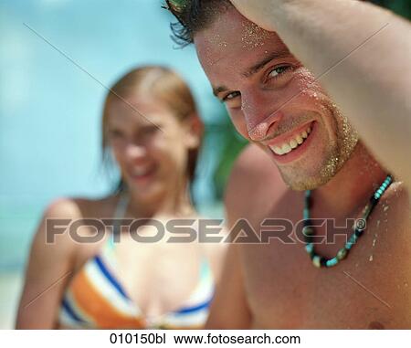 close up of smiling young man on the beach View Large Photo Image Stock Image - close up of smiling young man on the beach. Fotosearch
