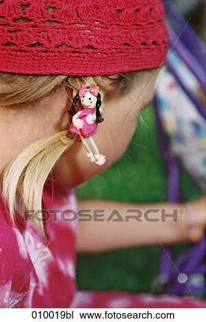 close-up of young girl (3-5 years) with red cap, looking away from camera View Large Photo Image Stock Image - close-up of young girl (3-5 years) with red cap, looking away from camera. Fotosearch