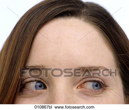 Close-up of young woman´s eyes and forehead View Large Photo Image Stock Image - Close-up of young woman´s eyes and forehead. Fotosearch
