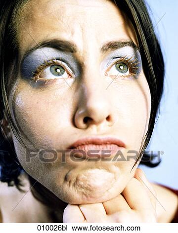 close-up portrait of a young woman pouting View Large Photo Image Stock Image - close-up portrait of a young woman pouting. Fotosearch