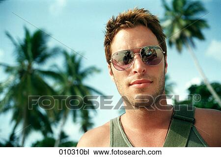 close-up portrait of man (30-35 years) with sunglasses View Large Photo Image Stock Image - close-up portrait of man (30-35 years) with sunglasses. Fotosearch
