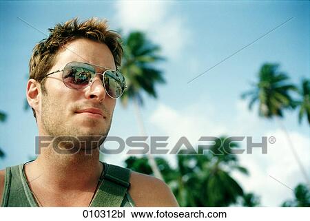 close-up portrait of man (30-35 years) with sunglasses View Large Photo Image Stock Image - close-up portrait of man (30-35 years) with sunglasses. Fotosearch