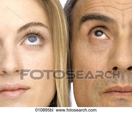 close-up portrait of mature man and young woman looking up View Large Photo Image Stock Image - close-up portrait of mature man and young woman looking up. Fotosearch