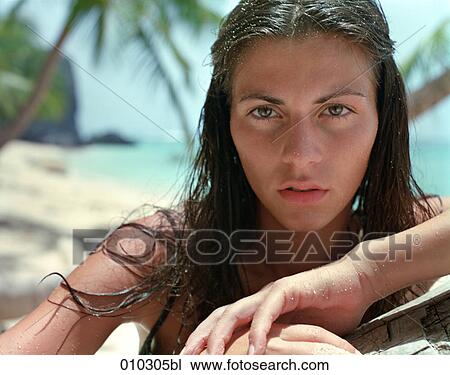 close-up portrait of woman (25-30 years) in tropical environment View Large Photo Image Stock Image - close-up portrait of woman (25-30 years) in tropical environment. Fotosearch