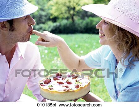 couple in love eating cake View Large Photo Image Stock Image - couple in love eating cake. Fotosearch