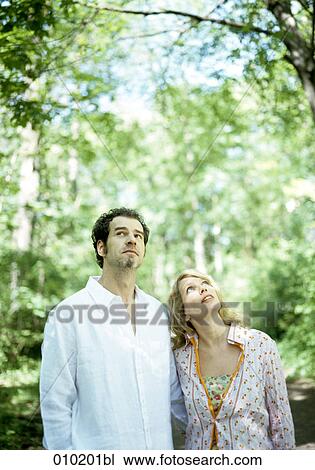 couple in the park enjoying the surroundings View Large Photo Image Stock Image - couple in the park enjoying the surroundings. Fotosearch